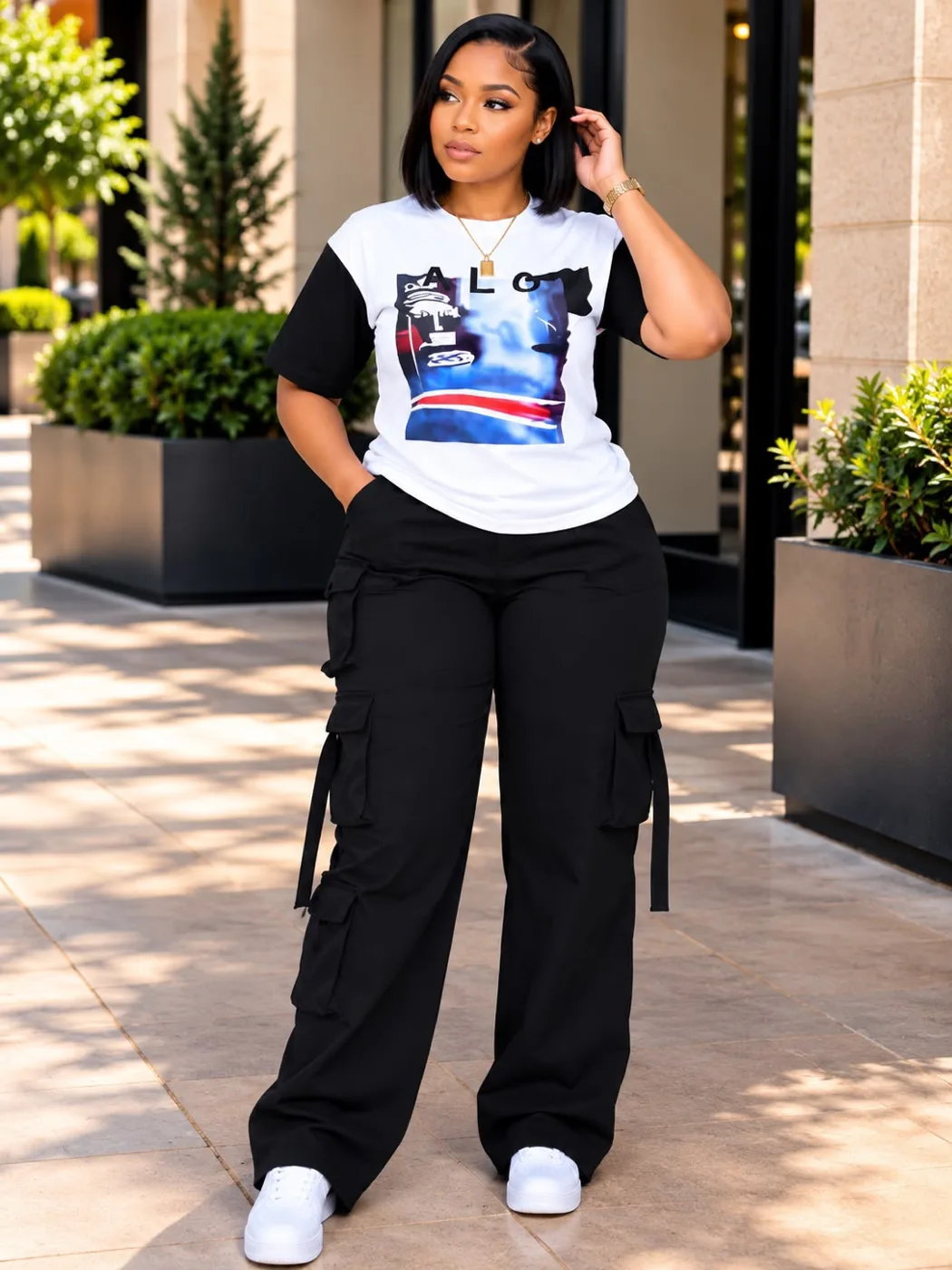 Graphic tee with black cargo pants